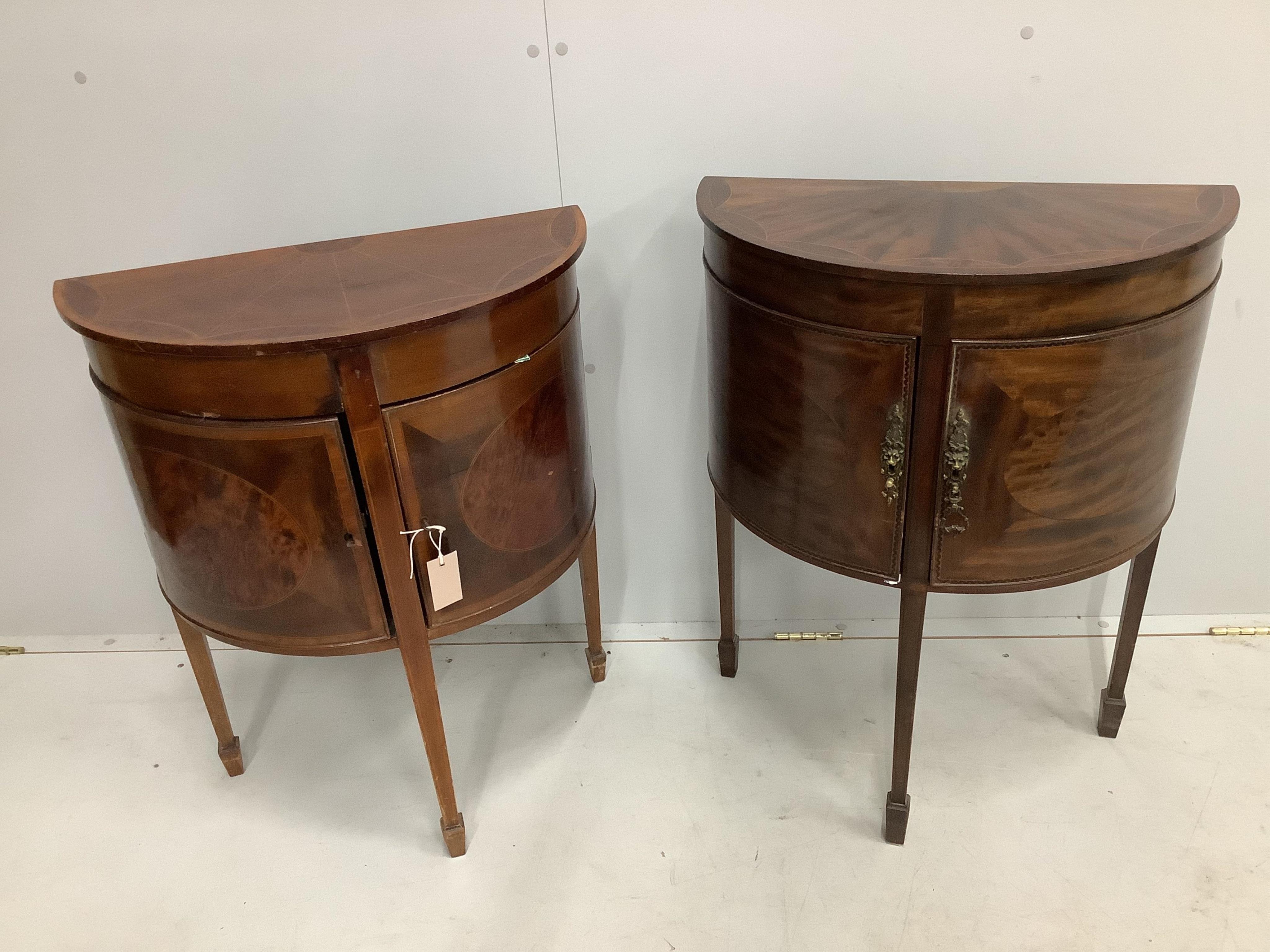 Two near matching Sheraton style inlaid mahogany D shape side cabinets, width 58cm, depth 29cm, height 76cm. Condition - fair